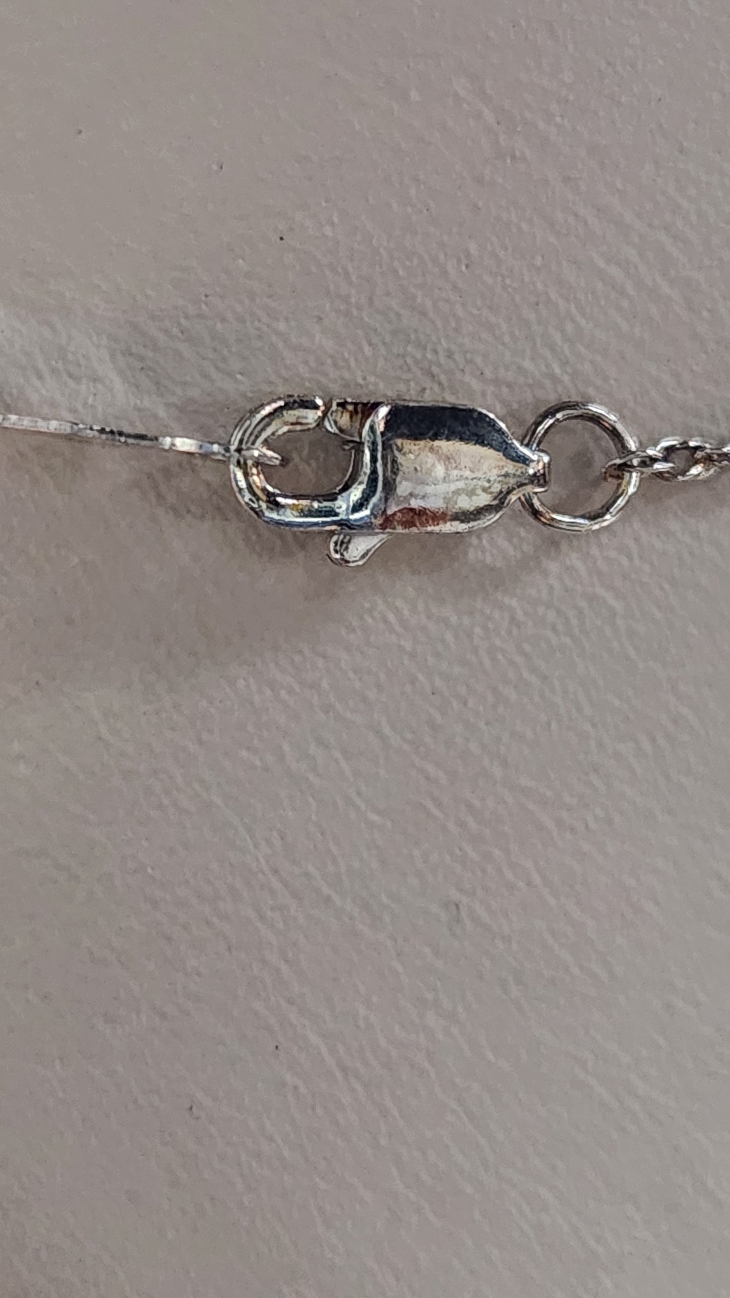 5.92ct Fancy cabochon Holley blue agate with a bezel set Texas topaz over California abalone. 1.02ct Oregon sunstone necklace. (Copy)