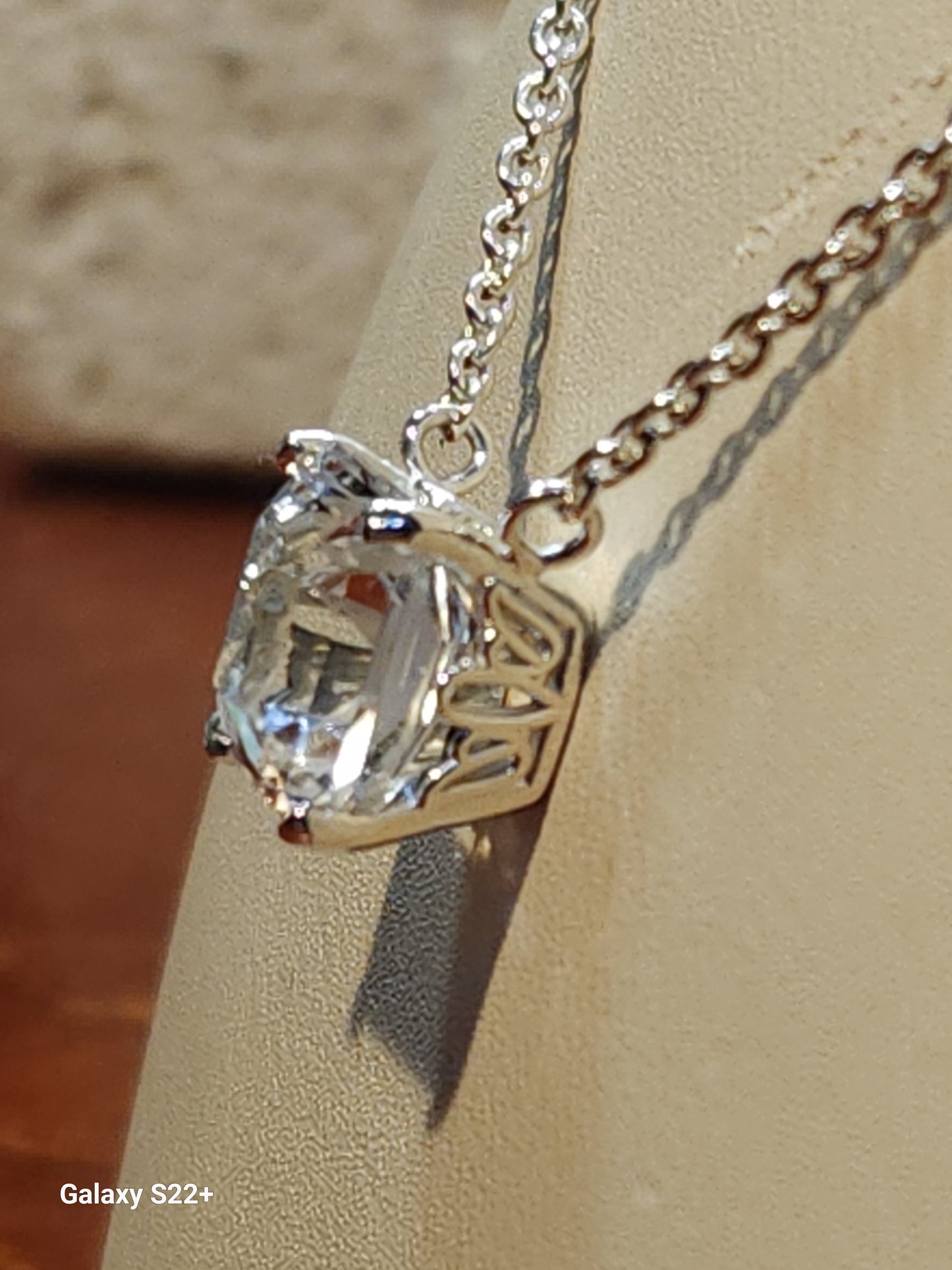 4.73ct colorless Mason Texas topaz square star cut is set in a simple sterling silver pendant and chain.