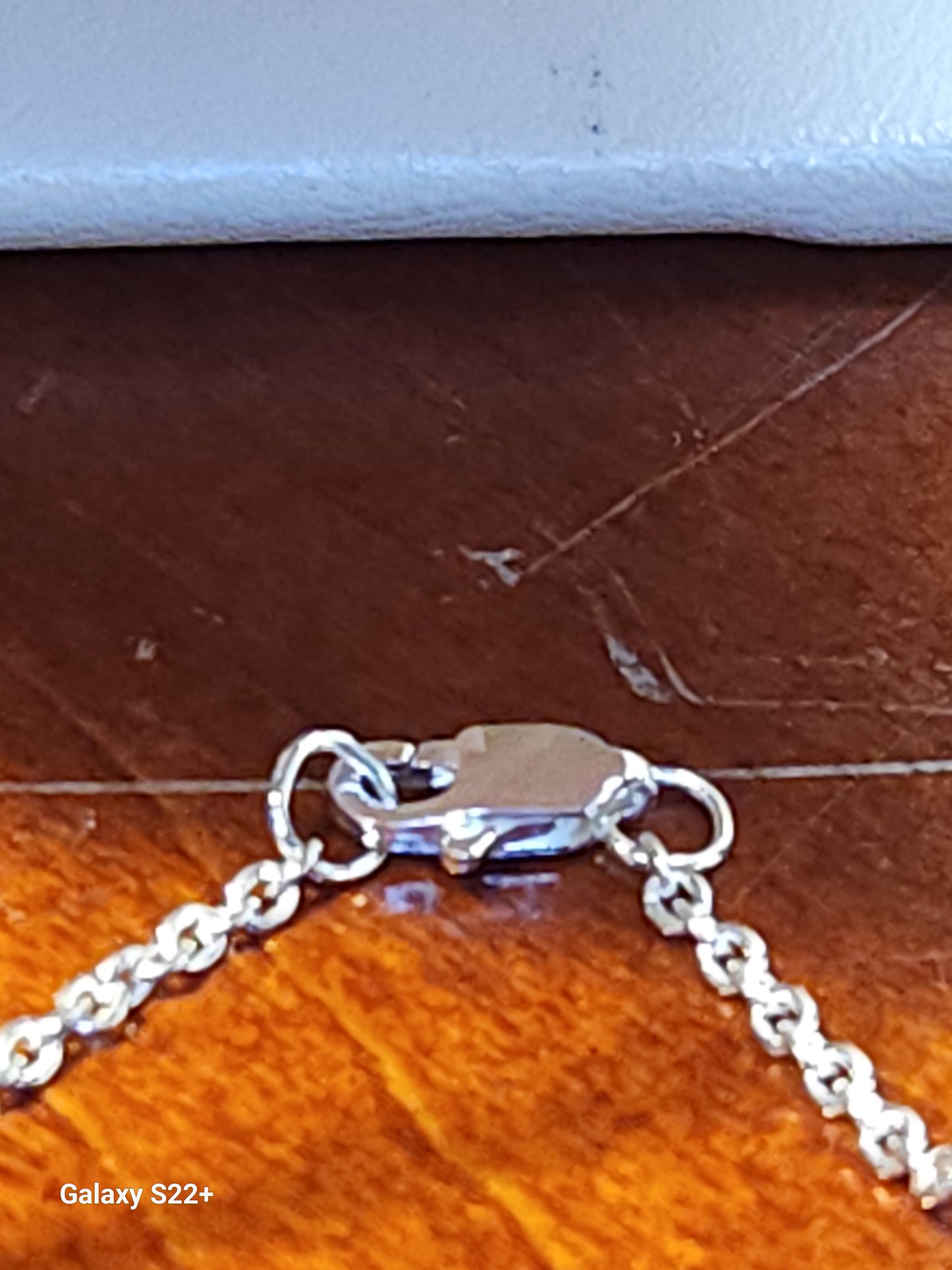 4.73ct colorless Mason Texas topaz square star cut is set in a simple sterling silver pendant and chain.