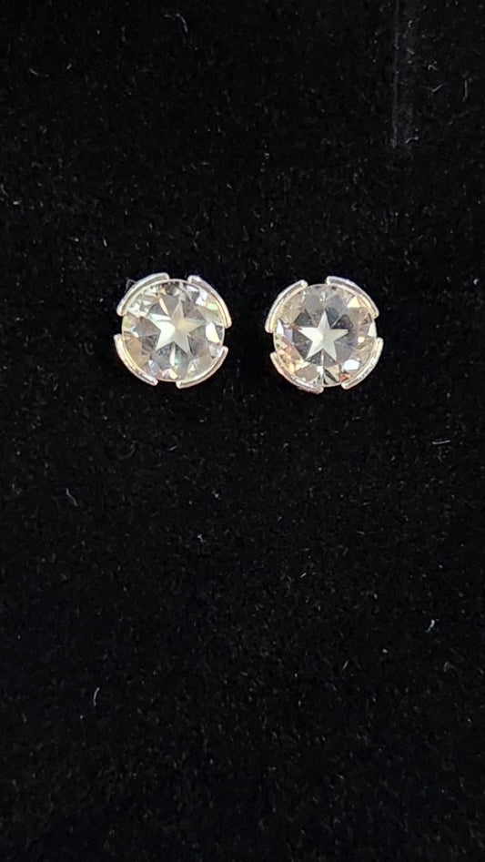 0.90cttw Mason County Clear Topaz Lone Brilliant Star mounted in a Continuum Sterling Silver semi-bezel set stud earrings.