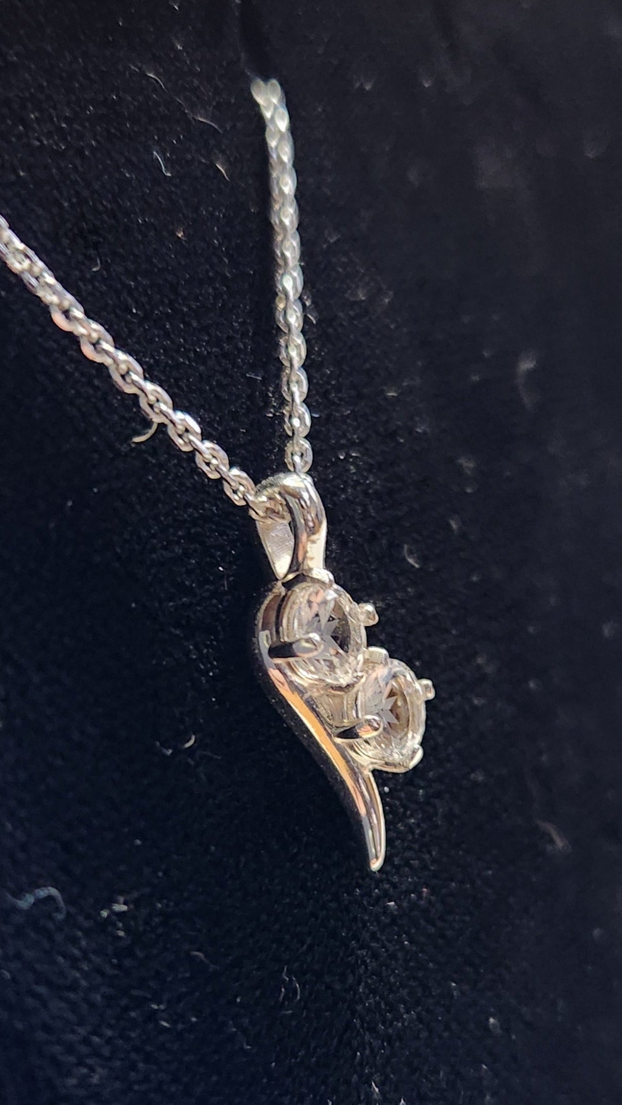 0.90cttw Mason County clear star brilliant cut topaz mounted in a 2 stone Continuum silver pendant.