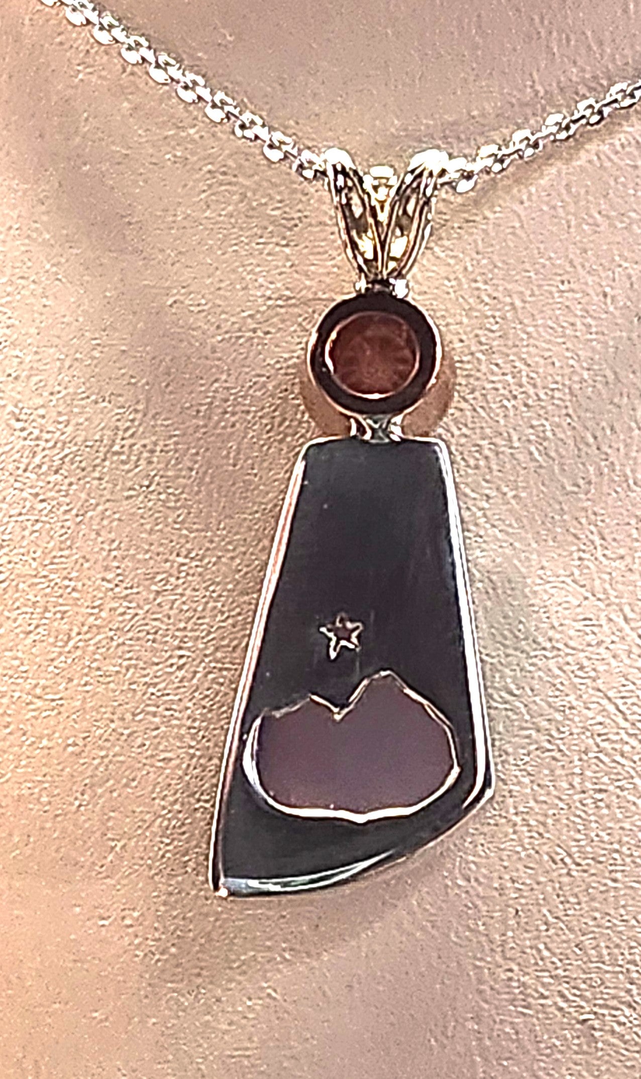 11.68ct Fancy cabochon Holley blue agate with 1.02ct Oregon sunstone necklace.