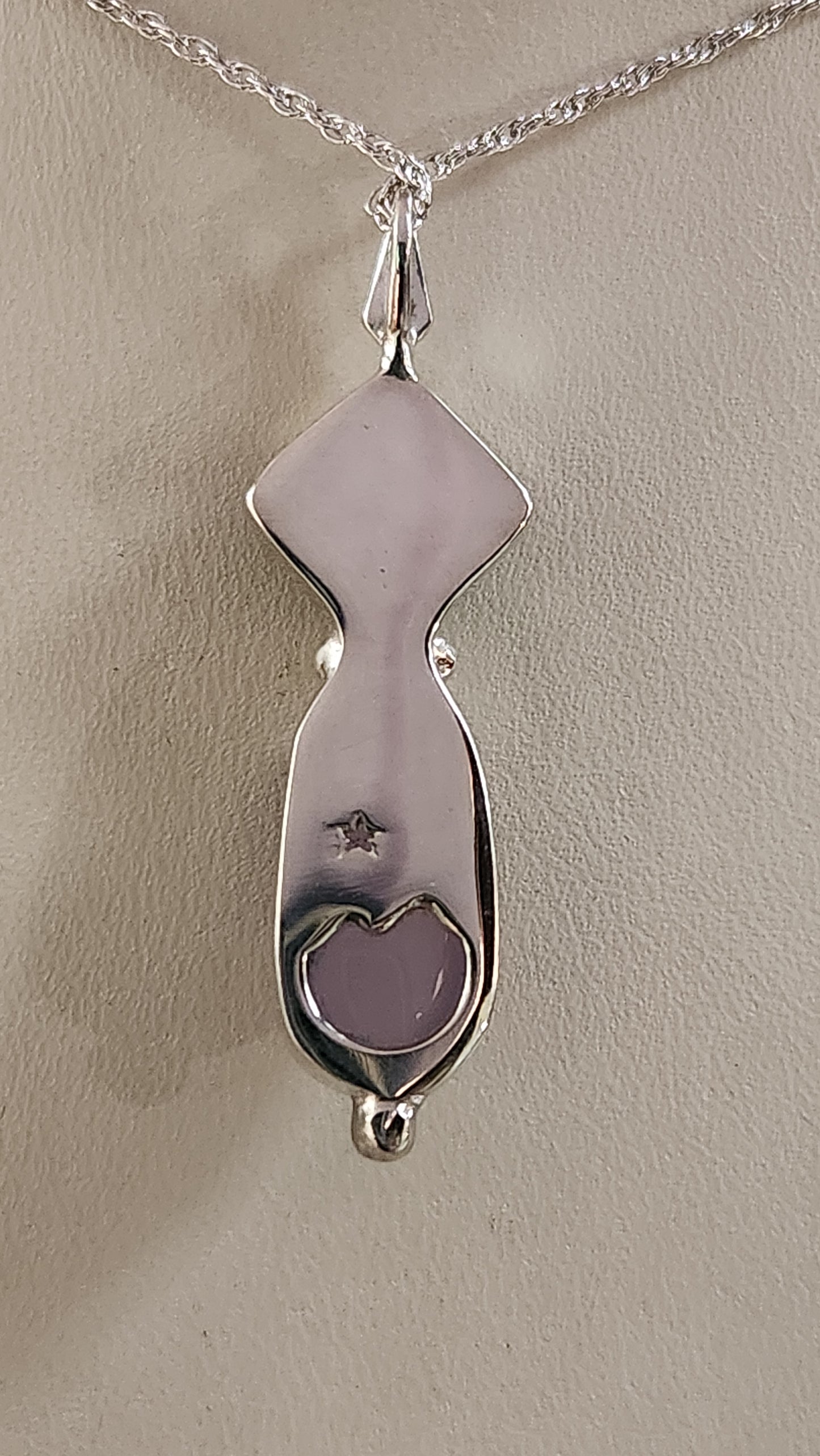 5.92ct Fancy cabochon Holley blue agate with a bezel set Texas topaz over California abalone. 1.02ct Oregon sunstone necklace. (Copy)