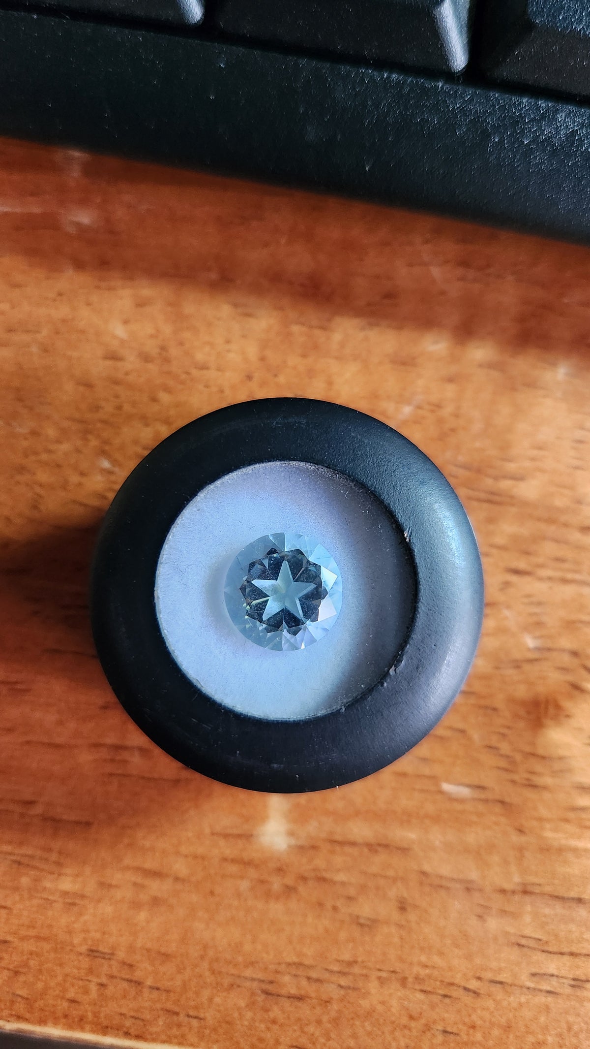3.80ct natural Blue topaz from Mason County, Texas. Lone Star Brilliant cut with a star.
