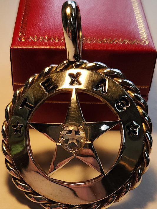 1.45ct Mason County clear star brilliant cut topaz is set in a 1948 20 peso silver pendant