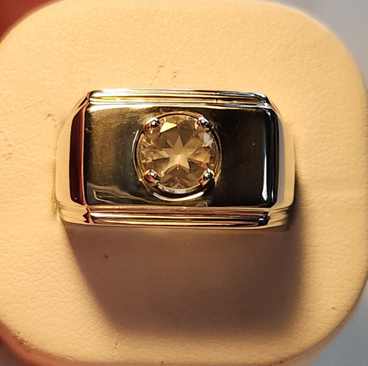 1.44ct Mason County clear star brilliant cut topaz mounted in a gents silver ring.